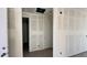 View of the hallway with doors and modern paint at 15773 W Beryl Ave, Waddell, AZ 85355