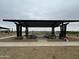 Neighborhood shaded picnic area features tables and seating for outdoor gatherings at 15773 W Beryl Ave, Waddell, AZ 85355