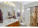 Bright bathroom featuring a shower-tub combo, large vanity, and neutral decor at 16450 E Ave Of The Fountains -- # 14, Fountain Hills, AZ 85268