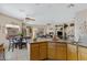 Kitchen island with dark countertops in an open concept home at 16450 E Ave Of The Fountains -- # 14, Fountain Hills, AZ 85268