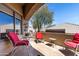 Relaxing covered patio with outdoor seating and scenic views at 16450 E Ave Of The Fountains -- # 14, Fountain Hills, AZ 85268