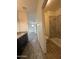 Bathroom featuring double sinks, a granite countertop, and wood-look floors at 1734 W Pollack St, Phoenix, AZ 85041