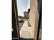 View of the pathway to the home from the entrance showing a rock garden and a concrete path at 1734 W Pollack St, Phoenix, AZ 85041