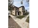 Charming two-story home featuring a covered entrance and well-maintained landscaping at 1734 W Pollack St, Phoenix, AZ 85041