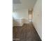 Upstairs hallway with carpet flooring and neutral paint at 1734 W Pollack St, Phoenix, AZ 85041