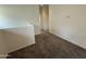 View of the landing area showcasing modern design and seamless carpet at 1734 W Pollack St, Phoenix, AZ 85041