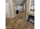 Inviting entryway with tile floors, neutral walls, leading to the front door and living areas at 17447 W Yavapai St, Goodyear, AZ 85338