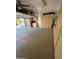 Large garage with ample storage cabinets at 17447 W Yavapai St, Goodyear, AZ 85338