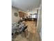 Eat-in kitchen with a modern design with stainless steel appliances and a decorative wall piece at 17447 W Yavapai St, Goodyear, AZ 85338