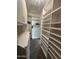 Walk-in closet with built-in storage, shelves, and drawers at 17447 W Yavapai St, Goodyear, AZ 85338