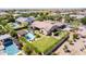 Aerial view of a home featuring a large lawn, a pool, and outdoor seating at 17673 E Bronco Dr, Queen Creek, AZ 85142