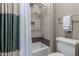 Tiled shower with decorative tile accent and handheld shower head at 17673 E Bronco Dr, Queen Creek, AZ 85142