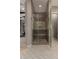 Modern shower featuring gray tile, seating and modern fixtures in a bright bathroom at 17673 E Bronco Dr, Queen Creek, AZ 85142