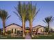 Charming single-story home with desert landscaping, stone accents, and covered front porch at 17673 E Bronco Dr, Queen Creek, AZ 85142