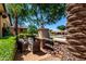 Cozy outdoor seating area with fireplace, perfect for entertaining or relaxation at 17673 E Bronco Dr, Queen Creek, AZ 85142