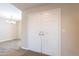 Spacious foyer featuring a double-door entry, laminate flooring, and a view into the living area at 1871 Leisure World --, Mesa, AZ 85206