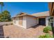 Cozy front entrance featuring a brick-paved patio and a charming double-door entry at 1871 Leisure World --, Mesa, AZ 85206