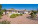 Inviting single-story home featuring well-maintained landscaping and a two-car garage at 1871 Leisure World --, Mesa, AZ 85206