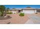 Charming single-story home showcasing desert landscaping and a convenient two-car garage at 1871 Leisure World --, Mesa, AZ 85206