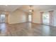 Generous living space with tile floors, vaulted ceiling, and large windows offering ample natural light at 1871 Leisure World --, Mesa, AZ 85206