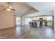 Open-concept living space with vaulted ceilings, tile flooring, and seamless flow to the kitchen at 1871 Leisure World --, Mesa, AZ 85206