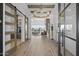 Bright and airy foyer with hardwood floors, decorative lighting, and an open view into the living space at 2153 E Cherrywood Pl, Chandler, AZ 85249