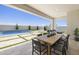 Relaxing outdoor dining area with views of pool, patio and fire pit at 2153 E Cherrywood Pl, Chandler, AZ 85249