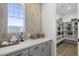 Spacious walk-in pantry features countertop, ample shelving, and bright lighting at 2153 E Cherrywood Pl, Chandler, AZ 85249