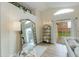 Open-concept living area featuring a sliding glass door, modern decor, and plenty of natural light at 21940 N 69Th Dr, Glendale, AZ 85310
