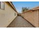 Wide side yard features paving stones and block wall at 21940 N 69Th Dr, Glendale, AZ 85310