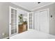 Bedroom with French doors leading to living space at 2232 E Karen Dr, Phoenix, AZ 85022