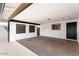 Spacious carport with white-painted walls and decorative lattice panels at 2232 E Karen Dr, Phoenix, AZ 85022