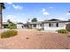 Lovely single-story home featuring desert landscaping and a well-manicured lawn at 2232 E Karen Dr, Phoenix, AZ 85022
