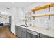 Beautiful updated kitchen featuring stainless steel appliances, subway tile, and gray cabinets at 2232 E Karen Dr, Phoenix, AZ 85022