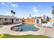 Beautiful backyard pool with lounge chairs, perfect for relaxation and enjoying the outdoor space at 2232 E Karen Dr, Phoenix, AZ 85022