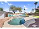 Backyard pool with lounge chairs and a Phoenix-themed mural, creating a vibrant and enjoyable outdoor space at 2232 E Karen Dr, Phoenix, AZ 85022