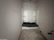An unfinished bathroom space with a new shower installed, awaiting final touches and customization at 22812 E Lords Way, Queen Creek, AZ 85142