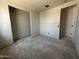 Unfinished bedroom with walk-in closets at 22812 E Lords Way, Queen Creek, AZ 85142