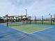Community pickleball court with nets and fencing offers recreational fun and social engagement for residents at 22812 E Lords Way, Queen Creek, AZ 85142