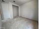 Unfinished room featuring an open closet space, ideal for organization and personalization at 22812 E Lords Way, Queen Creek, AZ 85142