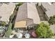 Aerial view of a home with a well-manicured backyard and covered patio area at 2394 E Santiago Trl, Casa Grande, AZ 85194