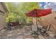 Charming backyard with shaded seating, ideal for enjoying outdoor moments at 2394 E Santiago Trl, Casa Grande, AZ 85194