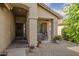 Welcoming front porch with comfortable seating and potted plants at 2394 E Santiago Trl, Casa Grande, AZ 85194