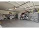 Spacious garage with organized storage and ample room for parking and hobbies at 2394 E Santiago Trl, Casa Grande, AZ 85194