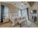 Serene main bedroom featuring a plush bed, patio access, and a ceiling fan at 2394 E Santiago Trl, Casa Grande, AZ 85194