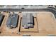 Aerial view of a new construction home featuring a tile roof and spacious lot at 2530 N Pony Ln, Casa Grande, AZ 85122