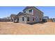 Home exterior showcasing a large backyard ready for landscaping and outdoor living at 2530 N Pony Ln, Casa Grande, AZ 85122