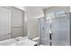 Clean bathroom with a glass-enclosed shower, mirror, and a sink at 2530 N Pony Ln, Casa Grande, AZ 85122