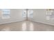 Spacious bedroom featuring natural light and tile flooring at 2530 N Pony Ln, Casa Grande, AZ 85122