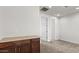 Bonus room with carpet, cabinets and multiple entrances at 2530 N Pony Ln, Casa Grande, AZ 85122